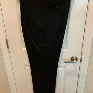 Men’s Black Dockers dress pants - pleated front. Never worn 38x34 price is each